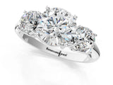 White gold Three-Stone Round Cut Diamond Engagement Ring with Prong Setting on a White Gold Band_15