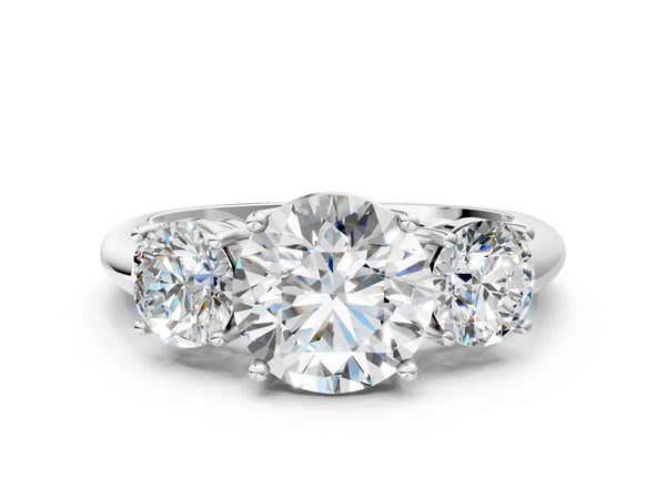 White gold Three-Stone Round Cut Diamond Engagement Ring with Prong Setting on a White Gold Band