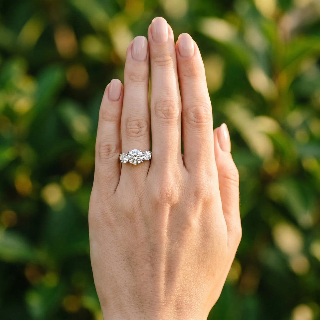 White gold Three-Stone Round Cut Diamond Engagement Ring with Prong Setting on a White Gold Band_66