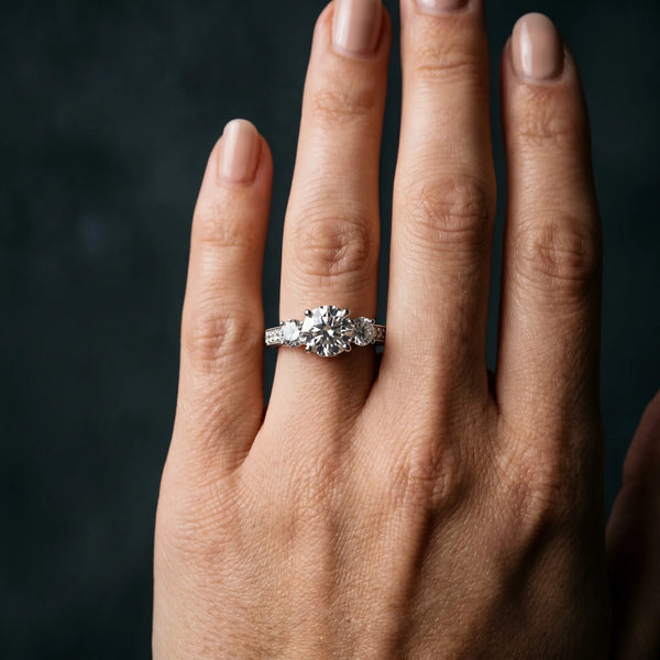 White gold Three-Stone Round Cut Diamond Engagement Ring with Split Shank and Prong Setting