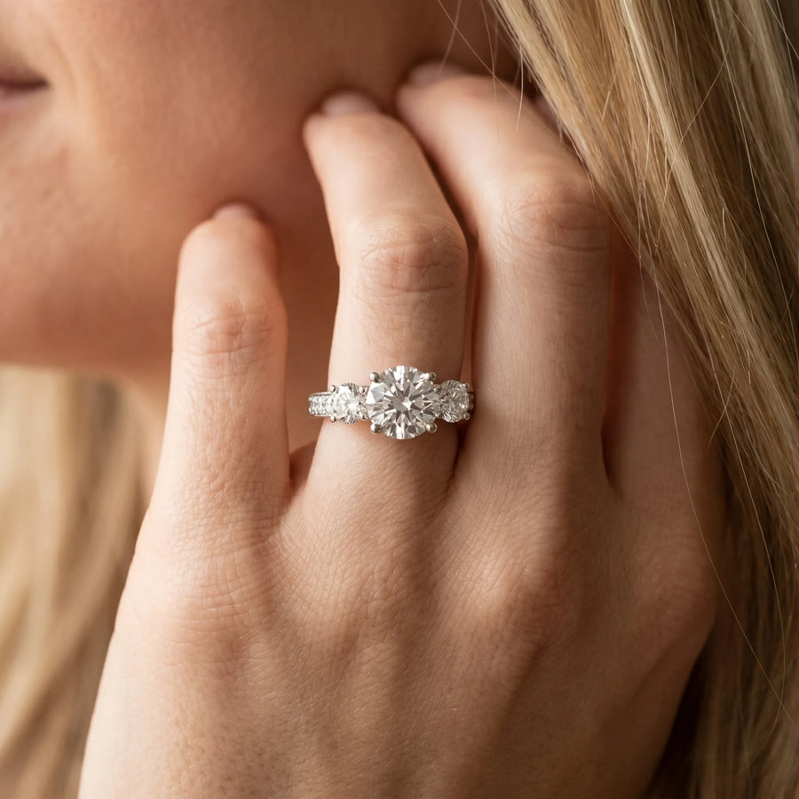 White gold Three-Stone Round Cut Diamond Engagement Ring with Split Shank and Prong Setting