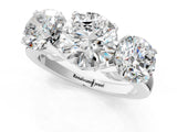 White gold Three-Stone Round Cut Diamond Ring with Channel Set Band and Four-Prong Setting_19