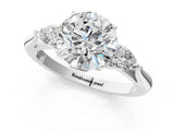 White gold Three-Stone Round Cut Diamond Ring with Pear  Side Stones in Four-Prong Setting_17