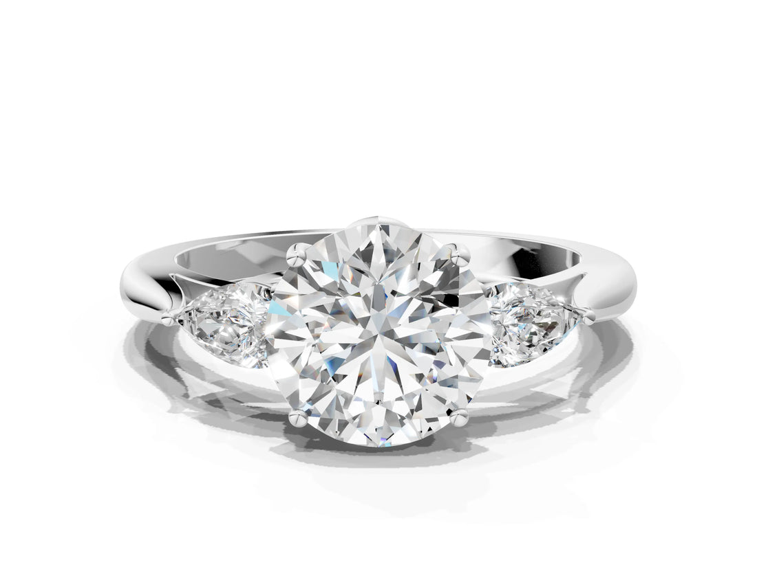 White gold Three-Stone Round Cut Diamond Ring with Pear  Side Stones in Four-Prong Setting_52