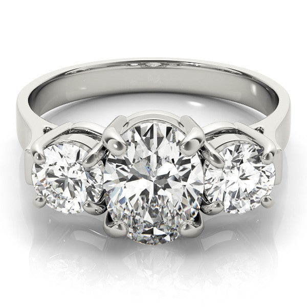 White gold Three-Stone Round Cut Diamond Ring with Round Accent Stones, Prong Setting, and Classic Band