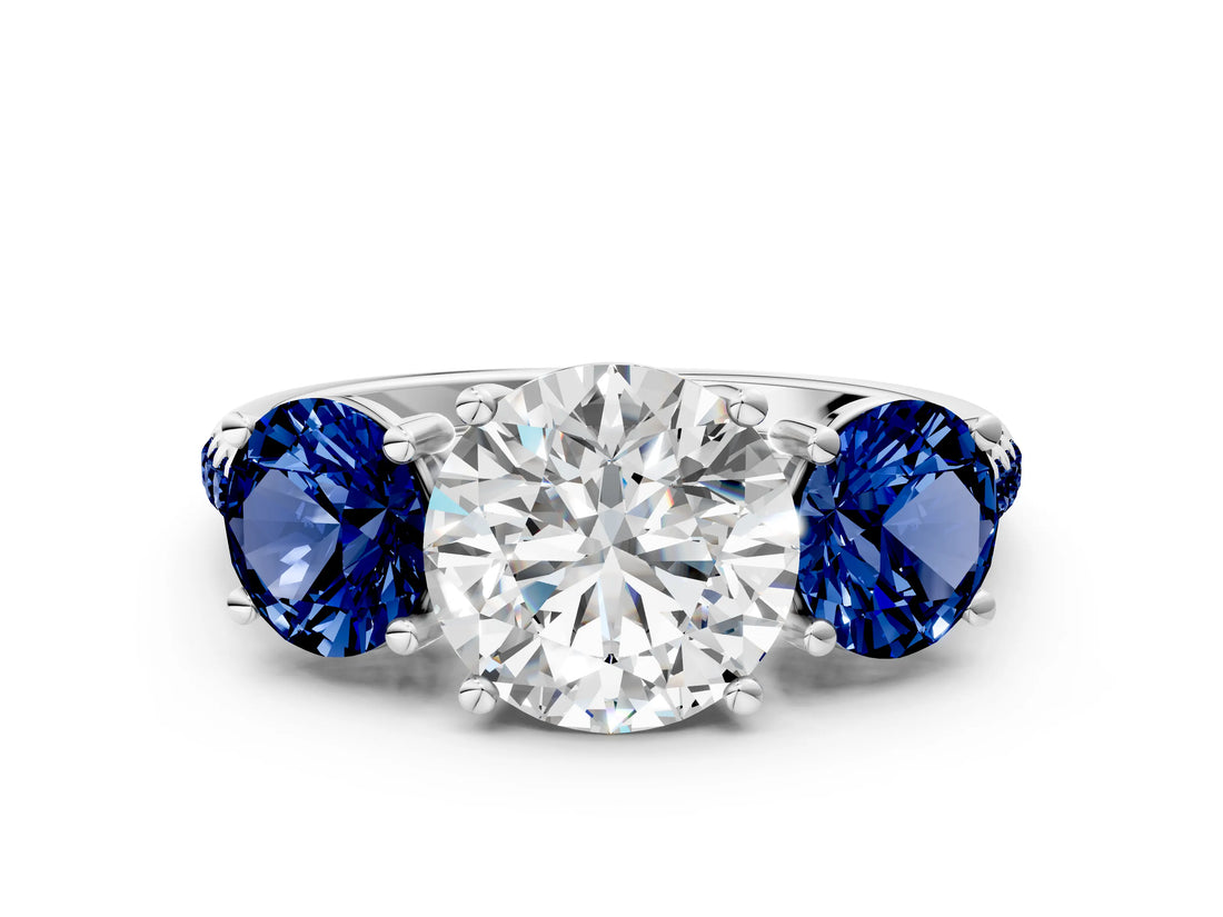 White gold Three-Stone Round Cut Diamond Ring with Round with Blue Sapphire side stone Pavé Band and Prong Setting_12