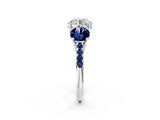 White gold Three-Stone Round Cut Diamond Ring with Round with Blue Sapphire side stone Pavé Band and Prong Setting_14