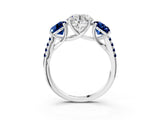 White gold Three-Stone Round Cut Diamond Ring with Round with Blue Sapphire side stone Pavé Band and Prong Setting_15