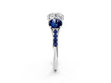 White gold Three-Stone Round Cut Diamond Ring with Round with Blue Sapphire side stone Pavé Band and Prong Setting_2