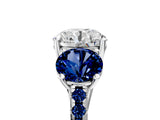 White gold Three-Stone Round Cut Diamond Ring with Round with Blue Sapphire side stone Pavé Band and Prong Setting_5