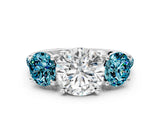 White gold Three-Stone Round Cut Diamond Ring with Round with Blue Topaz side stone Pavé Band and Prong Setting_12