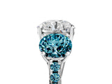 White gold Three-Stone Round Cut Diamond Ring with Round with Blue Topaz side stone Pavé Band and Prong Setting_17