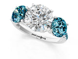 White gold Three-Stone Round Cut Diamond Ring with Round with Blue Topaz side stone Pavé Band and Prong Setting_1