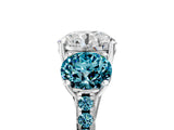 White gold Three-Stone Round Cut Diamond Ring with Round with Blue Topaz side stone Pavé Band and Prong Setting_5