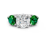 White gold Three-Stone Round Cut Diamond Ring with Round with Emerald side stone Pavé Band and Prong Setting