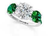White gold Three-Stone Round Cut Diamond Ring with Round with Emerald side stone Pavé Band and Prong Setting_1