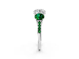 White gold Three-Stone Round Cut Diamond Ring with Round with Emerald side stone Pavé Band and Prong Setting_2