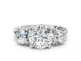 White gold Three-Stone Round Cut Diamond Ring with Round with Moissanite side stone Pavé Band and Prong Setting