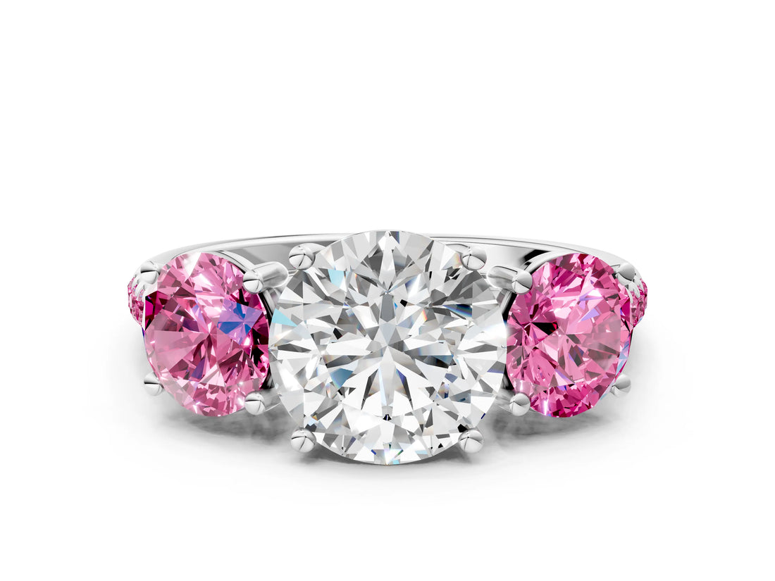 White gold Three-Stone Round Cut Diamond Ring with Round with Pink Sapphire side stone Pavé Band and Prong Setting