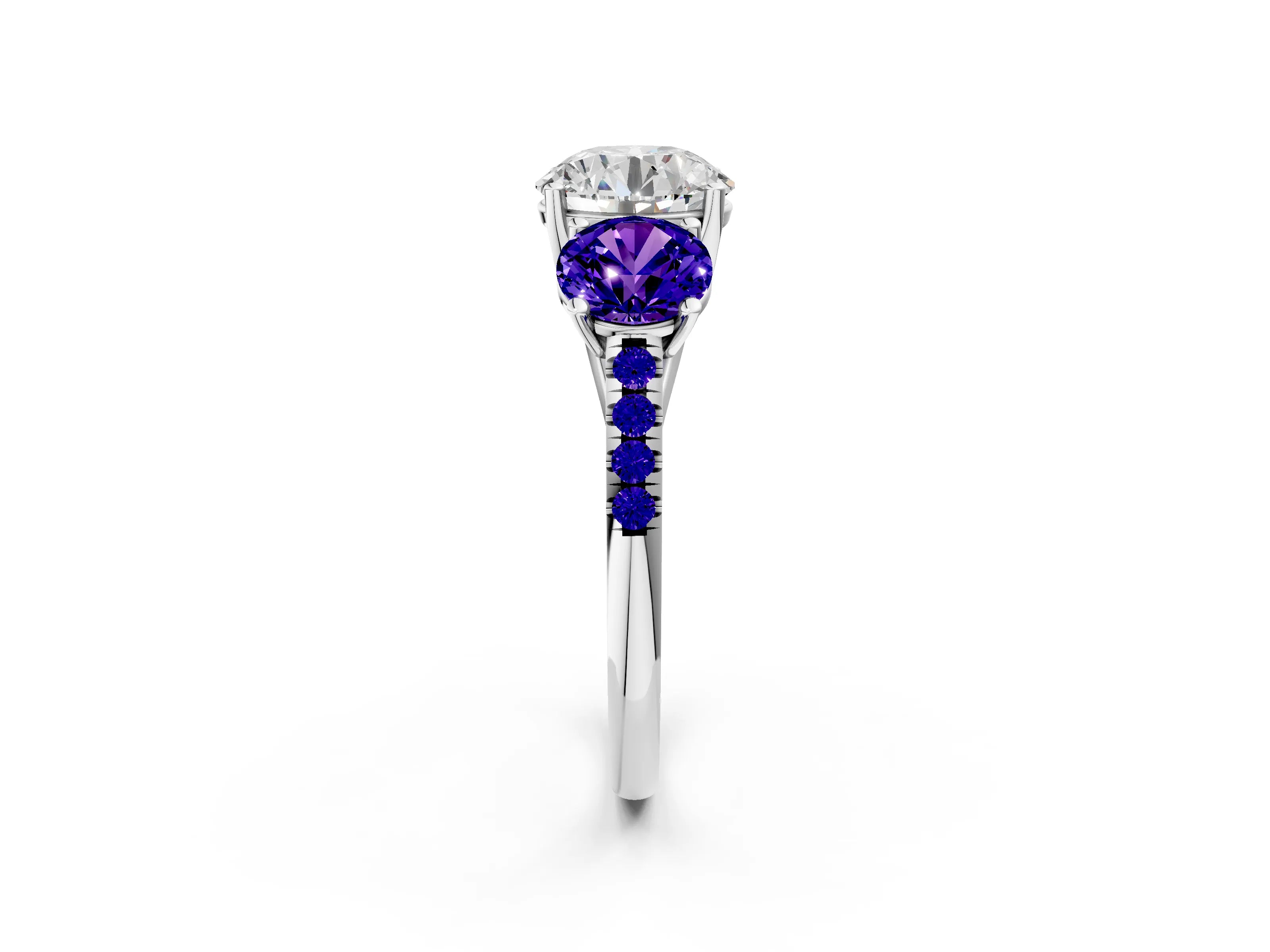 White gold Three-Stone Round Cut Diamond Ring with Round with Tanzanite side stone Pavé Band and Prong Setting_2