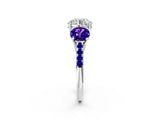 White gold Three-Stone Round Cut Diamond Ring with Round with Tanzanite side stone Pavé Band and Prong Setting_2