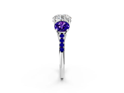 White gold Three-Stone Round Cut Diamond Ring with Round with Tanzanite side stone Pavé Band and Prong Setting_2