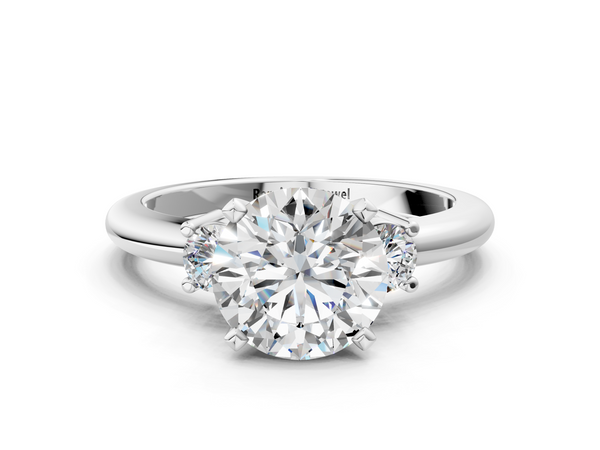 White gold Three-Stone Round Cut Diamond Solitaire with Prong Setting and Classic Band