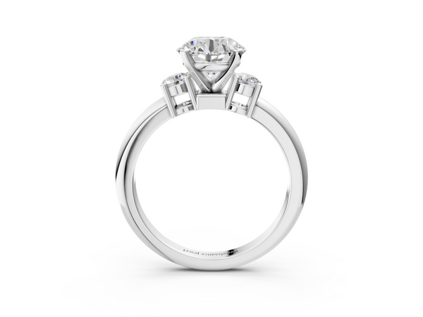 White gold Three-Stone Round Cut Diamond Solitaire with Prong Setting and Classic Band