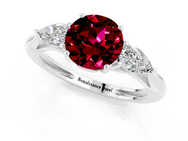 Platinum Three-Stone Round Cut Garnet Ring with Pear  Side Stones in Four-Prong Setting