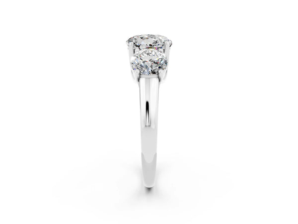 Platinum Three-Stone Round Cut Moissanite Engagement Ring with Prong Setting