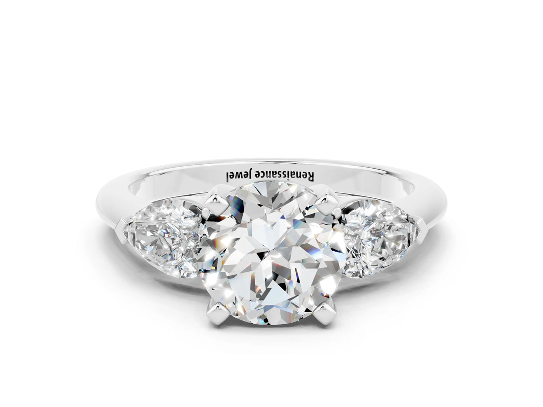 White gold Three-Stone Round Cut Moissanite Ring with Pear Side Stones and Four-Prong Setting
