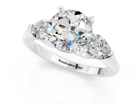 White gold Three-Stone Round Cut Moissanite Ring with Pear Side Stones and Four-Prong Setting_1