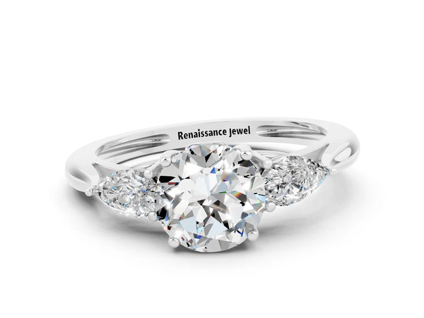 Silver Three-Stone Round Cut Moissanite Ring with Pear  Side Stones in Four-Prong Setting
