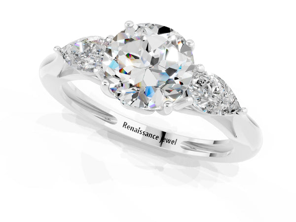 Silver Three-Stone Round Cut Moissanite Ring with Pear  Side Stones in Four-Prong Setting