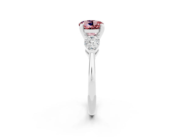 Platinum Three-Stone Round Cut Morganite Ring with Pear Side Stones and Four-Prong Setting