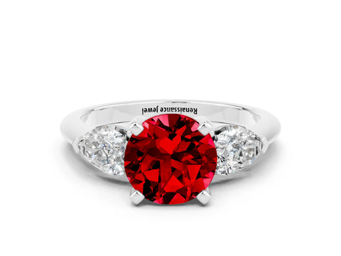 White gold Three-Stone Round Cut Ruby Ring with Pear Side Stones and Four-Prong Setting