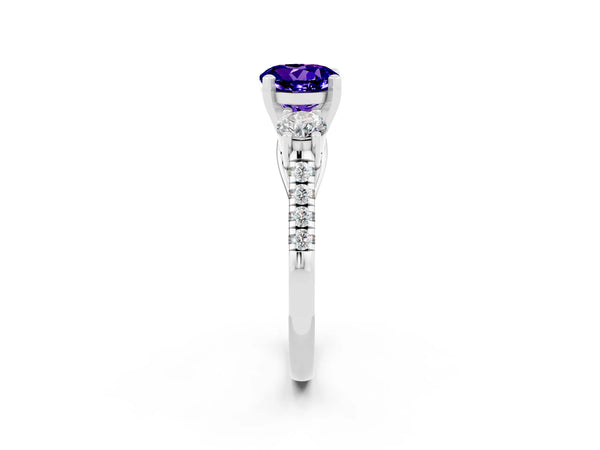 Platinum Three-Stone Round Cut Tanzanite Pavé Band with Four-Prong Setting