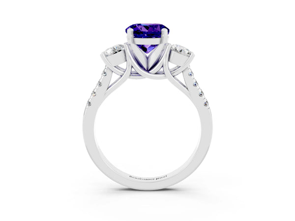 Platinum Three-Stone Round Cut Tanzanite Pavé Band with Four-Prong Setting