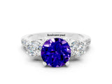 White gold Three-Stone Round Cut Tanzanite Pavé Band with Four-Prong Setting