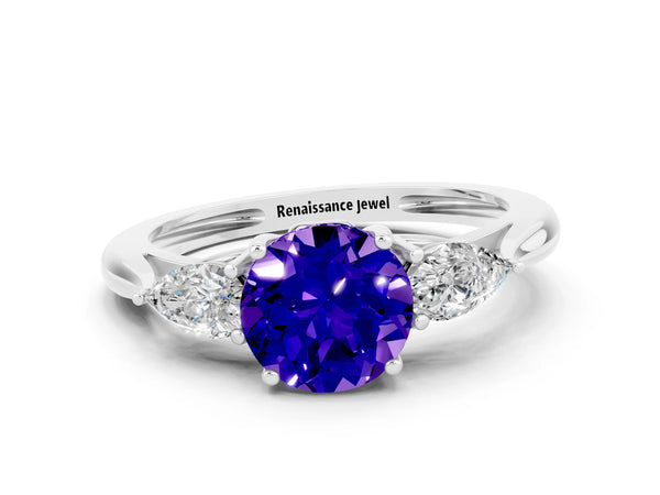Platinum Three-Stone Round Cut Tanzanite Ring with Pear  Side Stones in Four-Prong Setting
