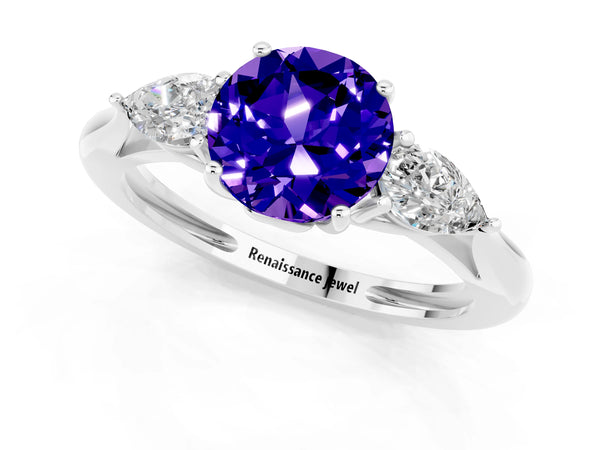 Silver Three-Stone Round Cut Tanzanite Ring with Pear  Side Stones in Four-Prong Setting