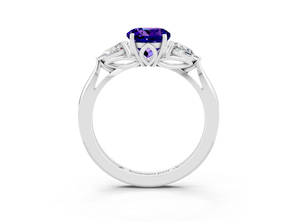 Platinum Three-Stone Round Cut Tanzanite Ring with Pear  Side Stones in Four-Prong Setting