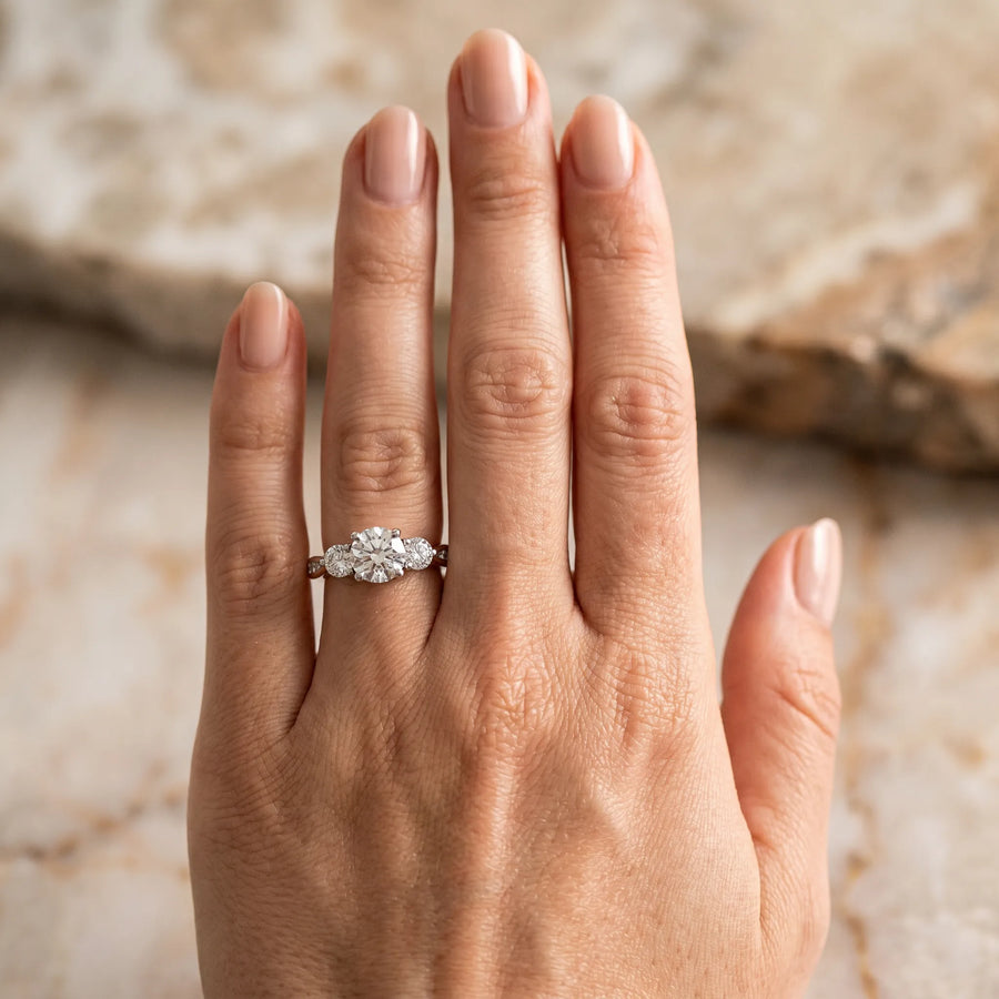 White gold Three-Stone Round Diamond Channel Set Engagement Ring with Prong Setting