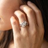14K White Gold Three-Stone 2.55 Carat H VS1 Round Diamond Crossover Band with Channel Prong Setting