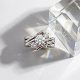 14K White Gold Three-Stone 2.55 Carat H VS1 Round Diamond Crossover Band with Channel Prong Setting