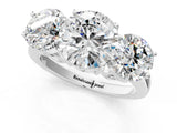 White gold Three-Stone Round Diamond Engagement Ring with Prong Setting on a Classic Band_12