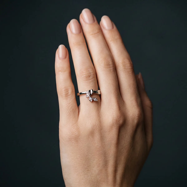 Platinum Three-Stone Round Diamond Leaf Bypass Ring with Bezel Setting