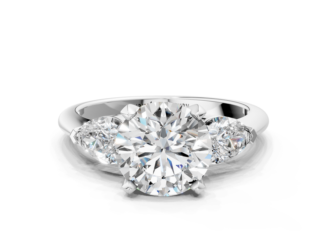 White gold Three-Stone Round Diamond Ring with Pear Side Stones in Four-Prong Setting_74