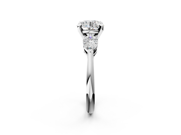 White gold Three-Stone Round Cut Diamond Ring with Pear Side Stones and Four-Prong Setting