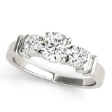 White gold Three-Stone Round Diamond Solitaire Ring with Channel Band and Prong Setting